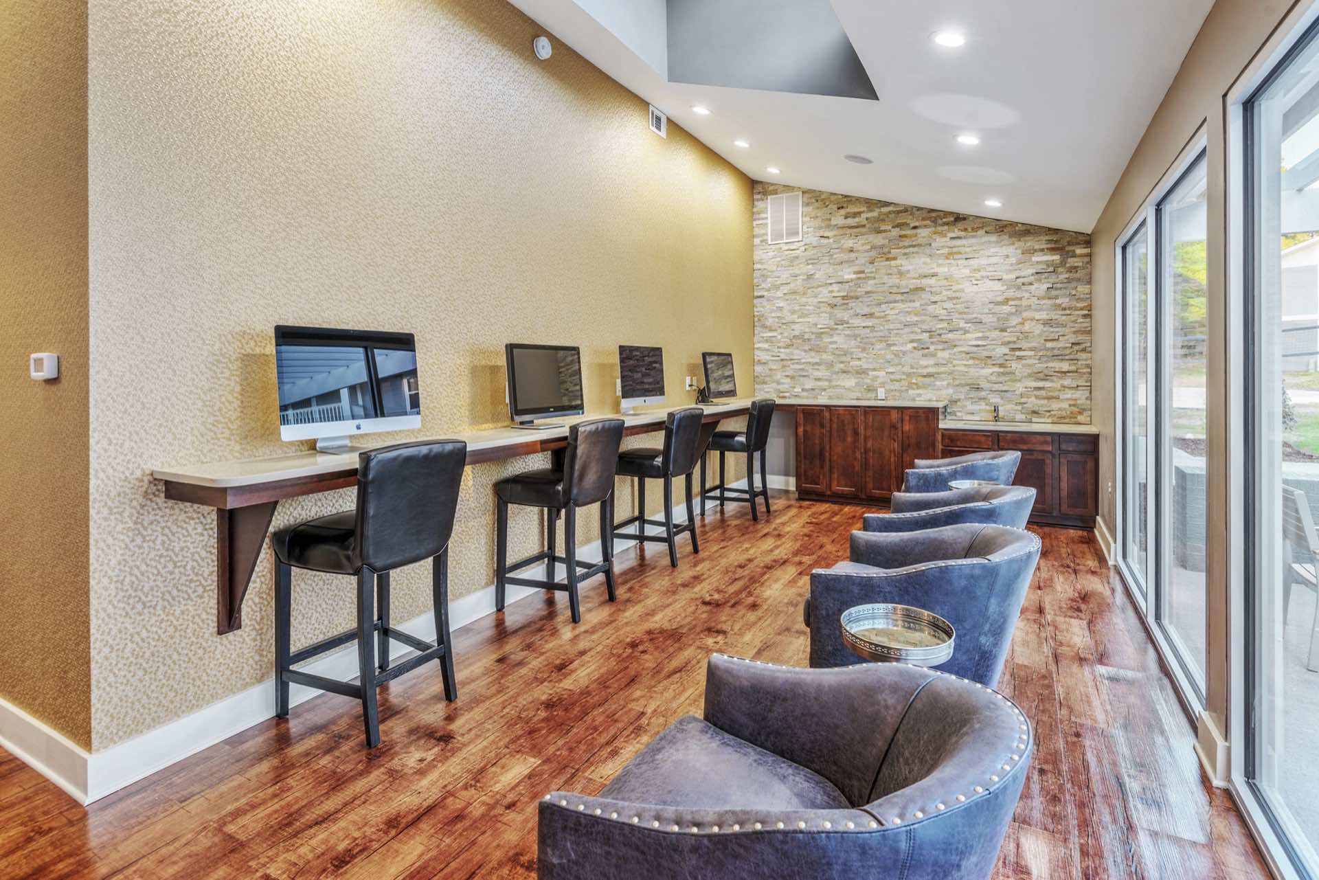 business center with four computer workstations