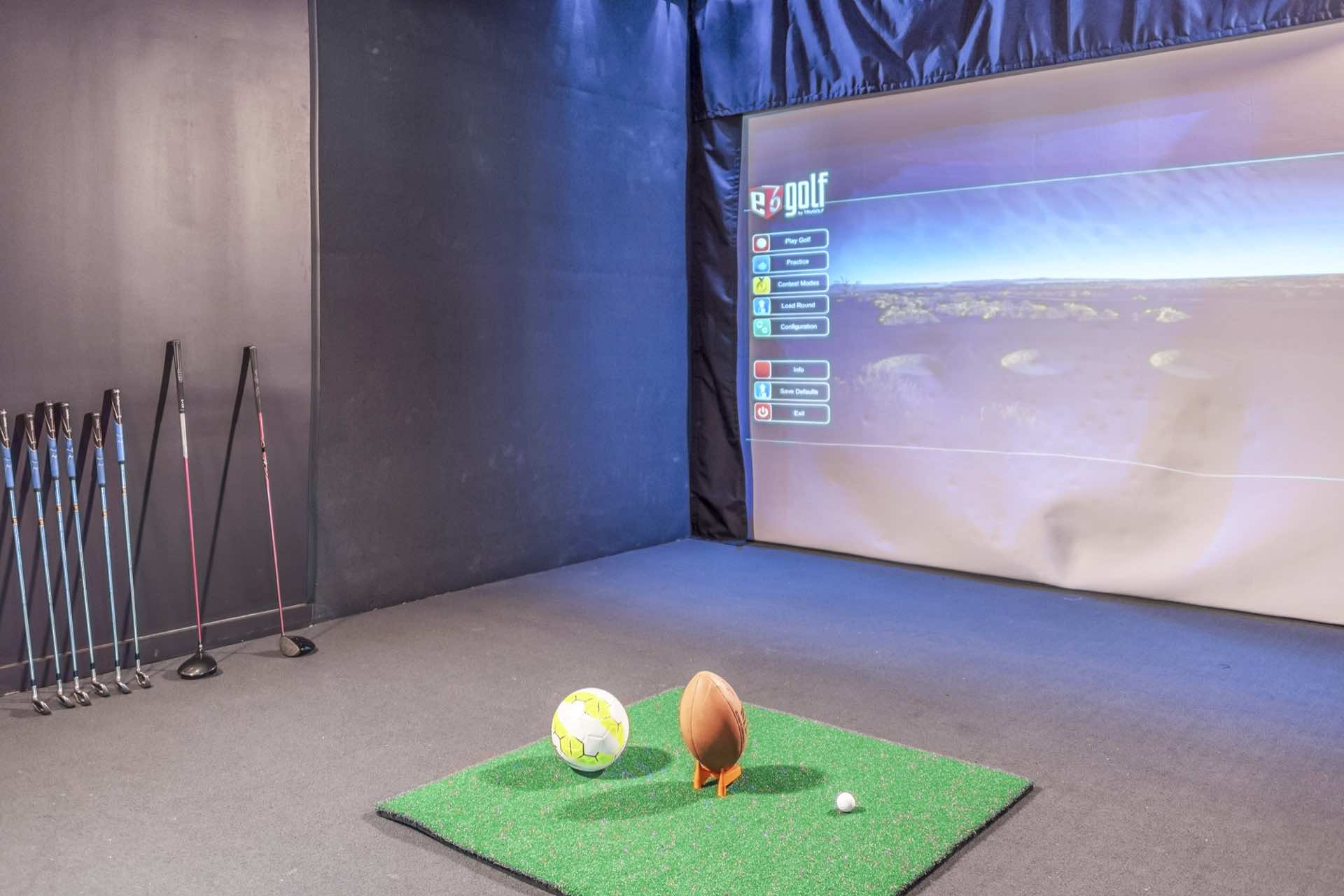 play golf, football or soccer in the sports simulation room