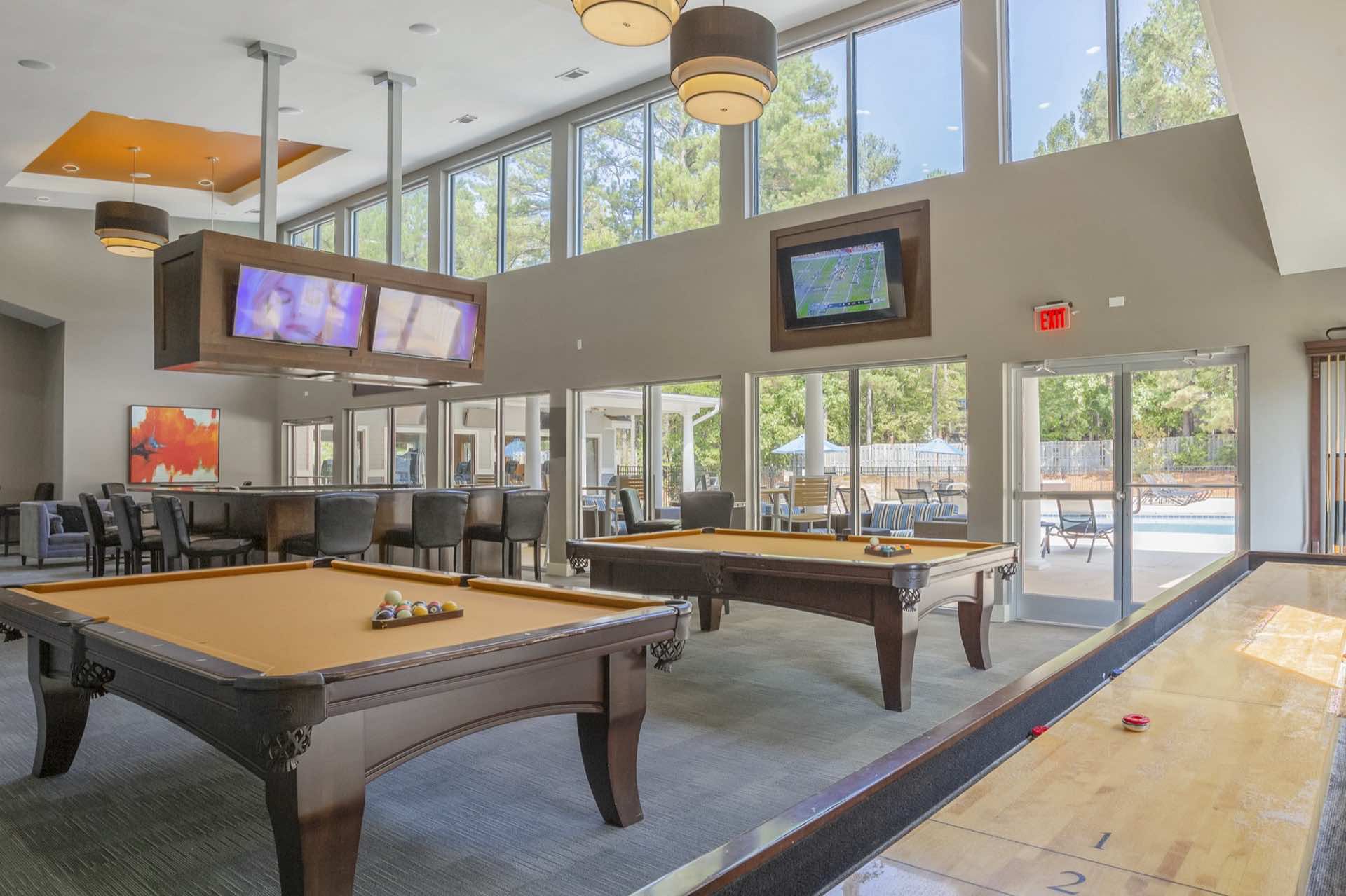 pool tables, shuffleboard and tvs