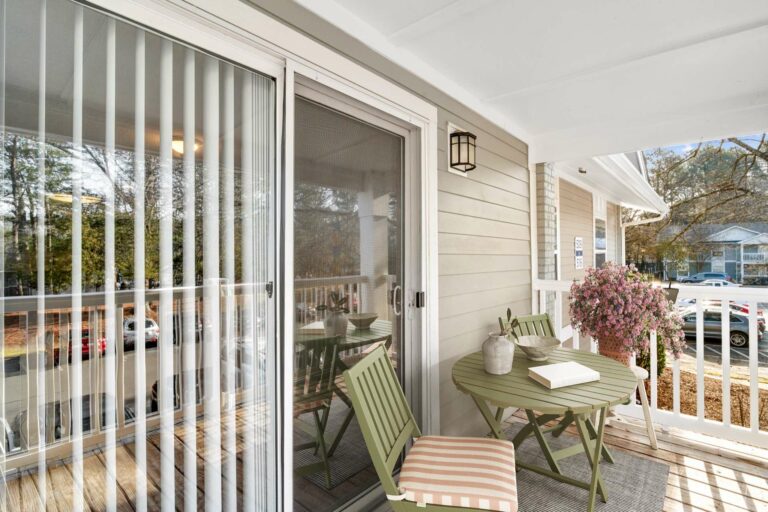 small patio with table and chairs